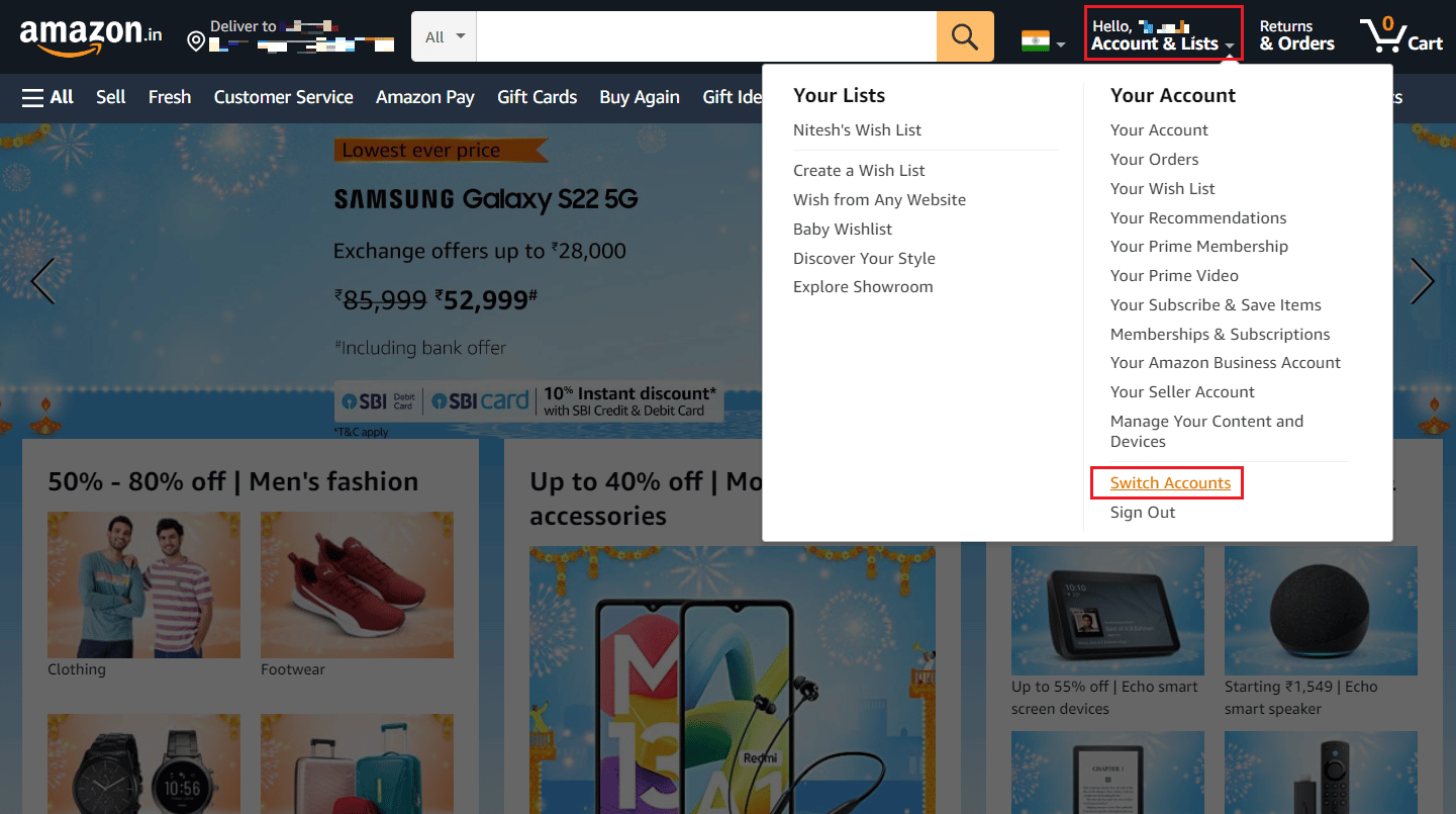 Hover over Account & Lists and click on Switch Accounts