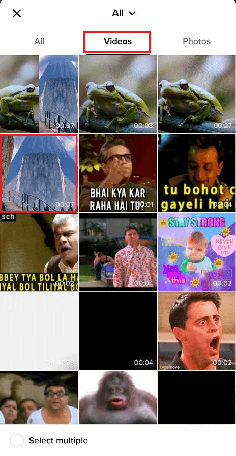 Switch to the Videos tab and select the desired saved video | Upload a video from your camera roll to your TikTok draft