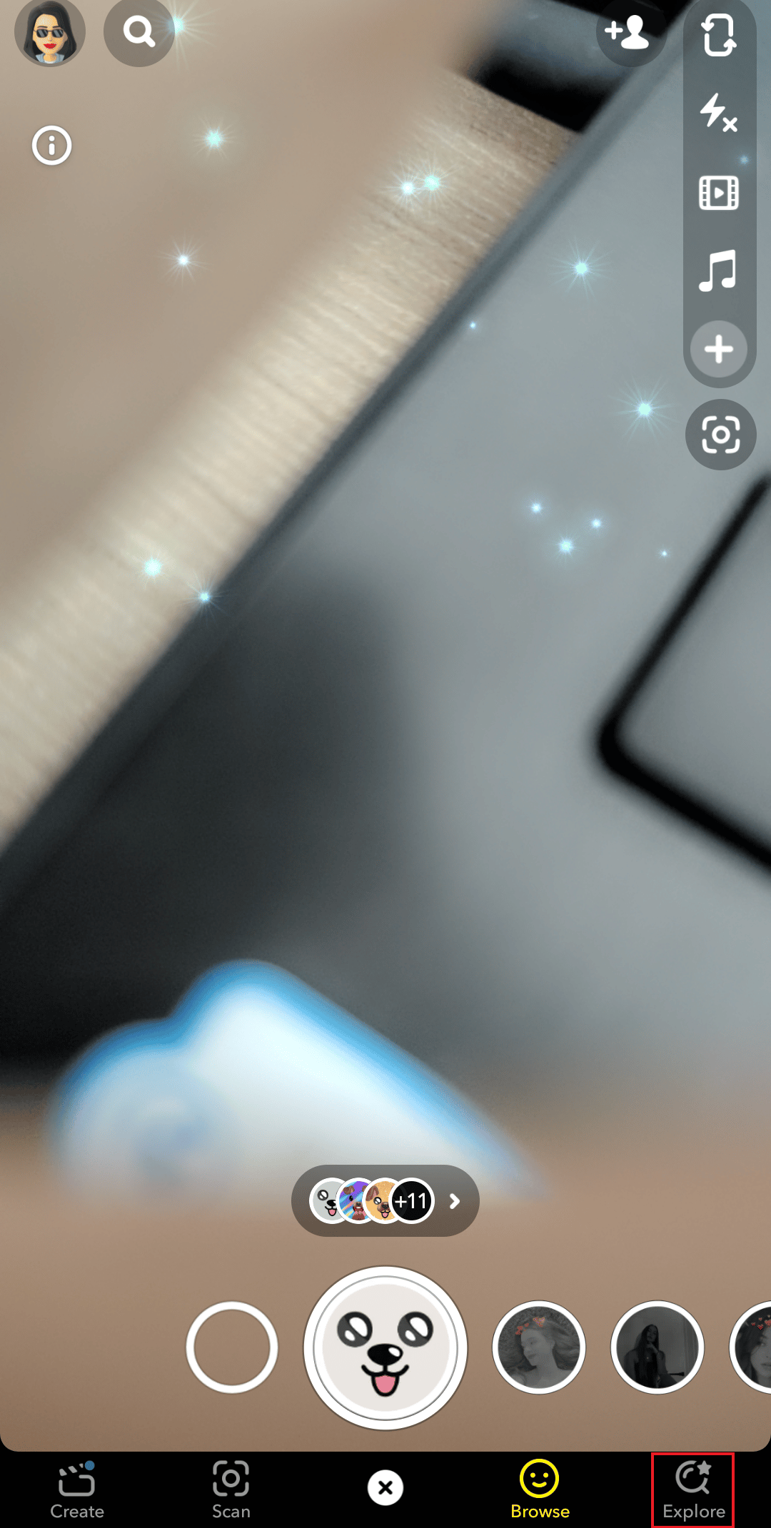 go to explore option on snapchat