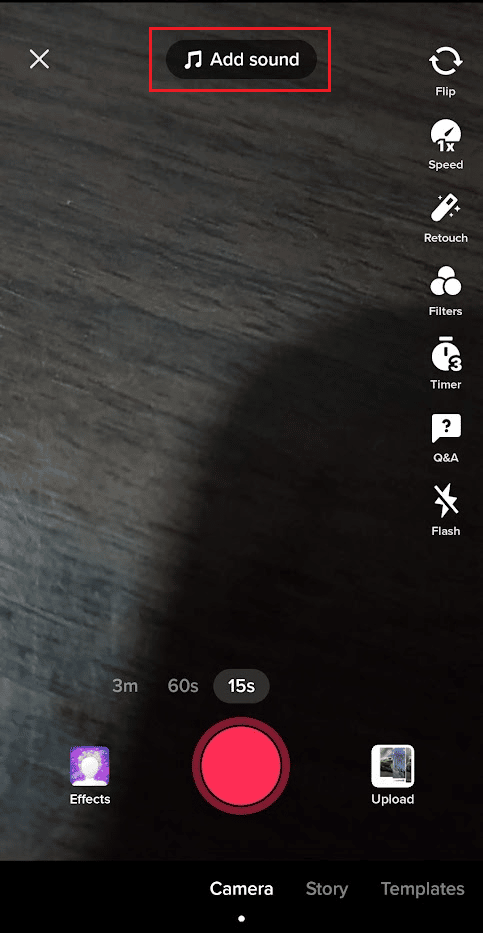 Tap on the Add sound option from the top of the camera screen