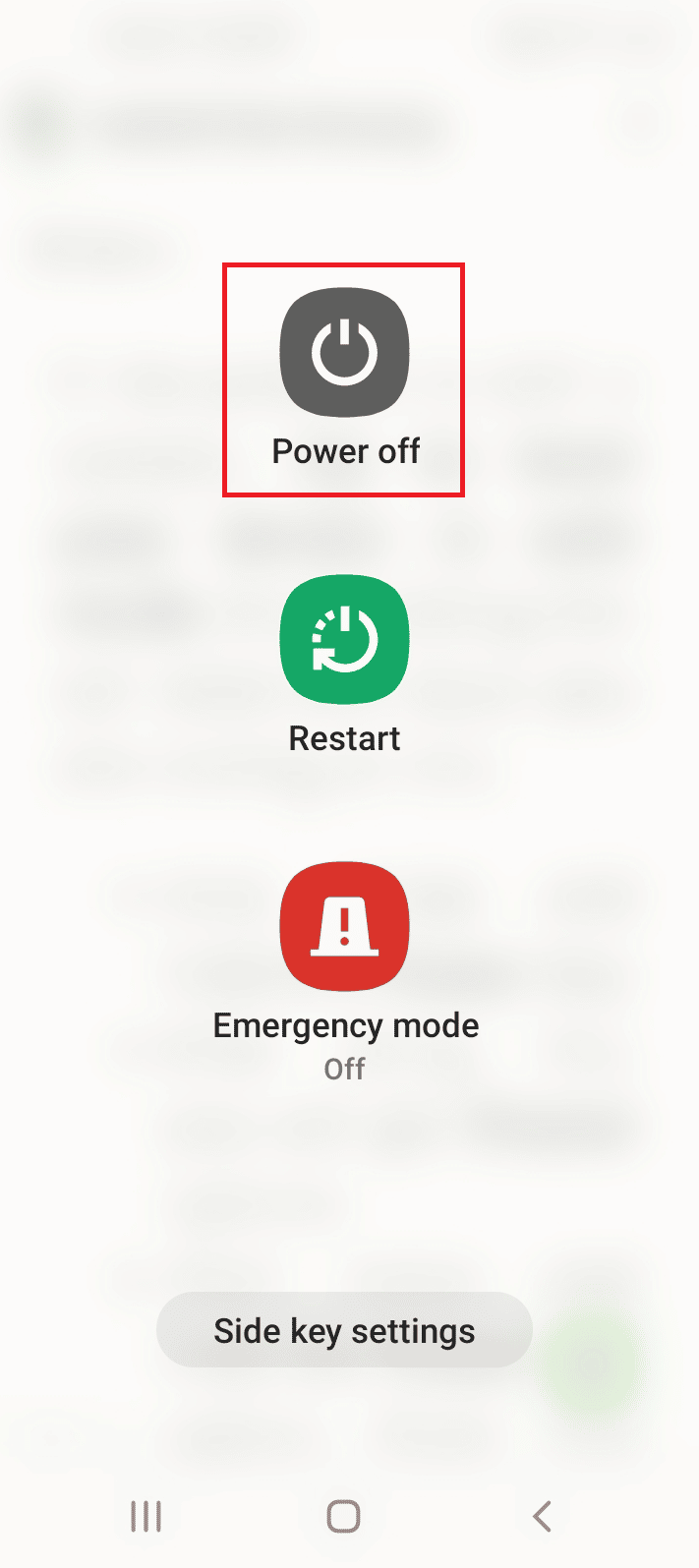Long press the power button at the side and long tap on the Power off option