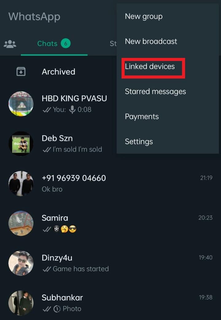 From the options, tap on Linked devices