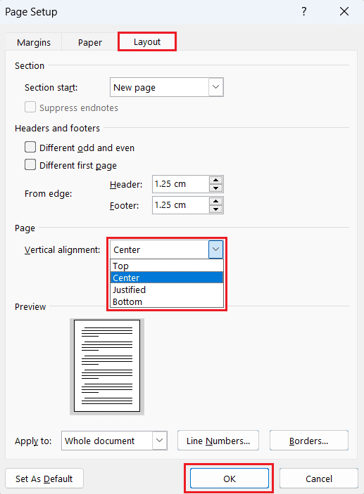 Select the Layout tab - Choose Top, Center, Justified, or Bottom - OK