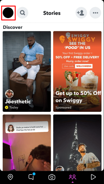 Tap on the story icon at the top left corner of your screen. 