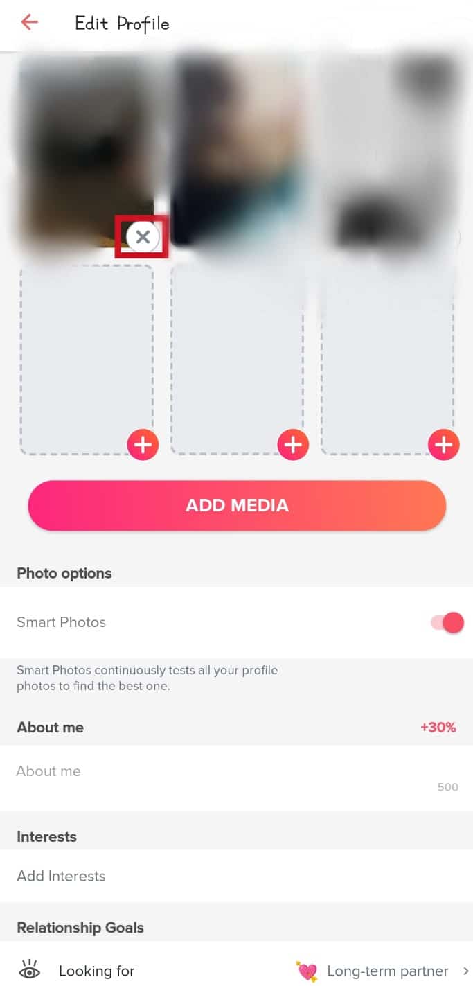 Tap on the X button on the photo that is not loading=