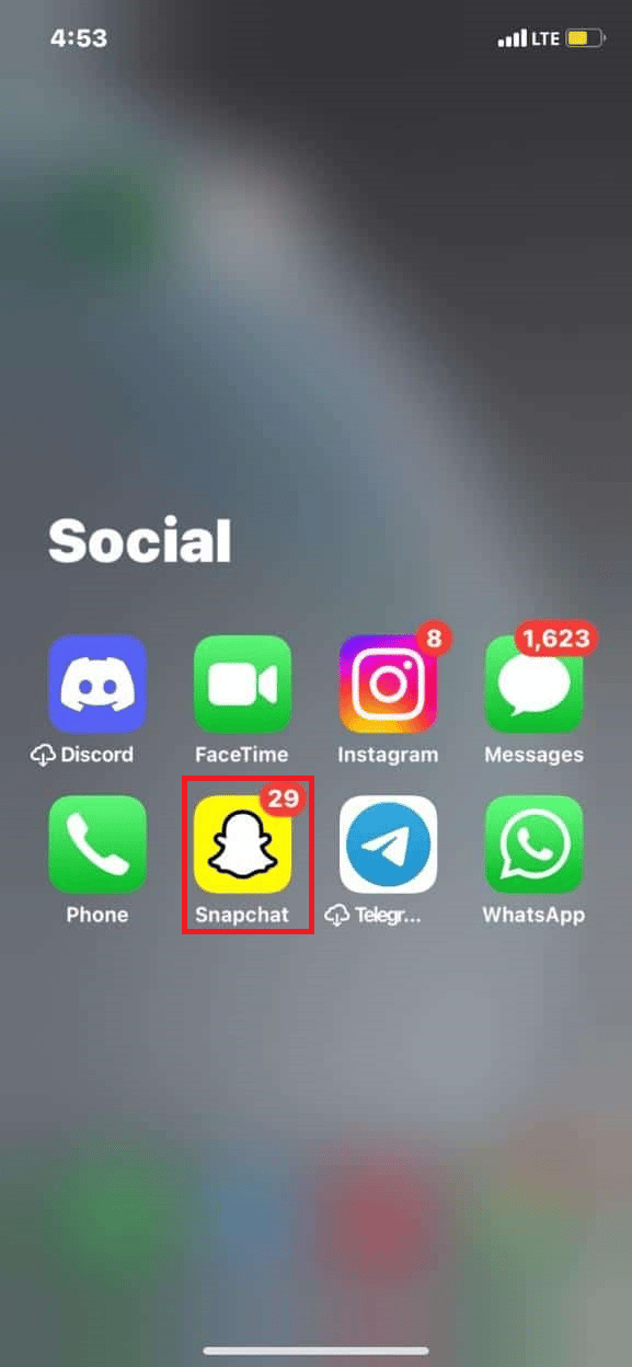 Locate and tap on the Snapchat application to open it