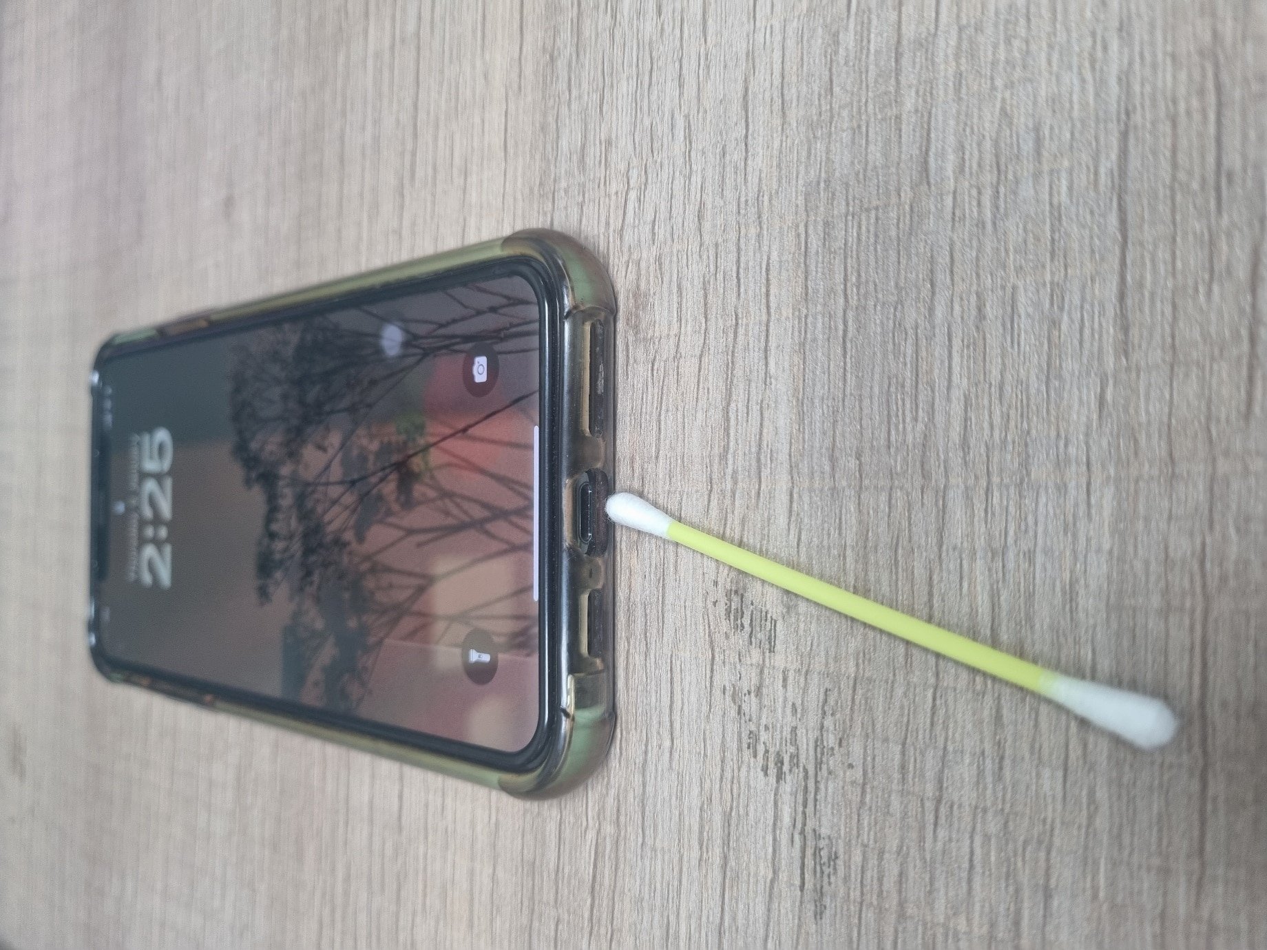 iphone cleaning with cotton swab | 